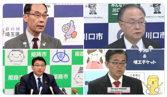 penampakan maskot dibalik press conference terkait covid di jepang